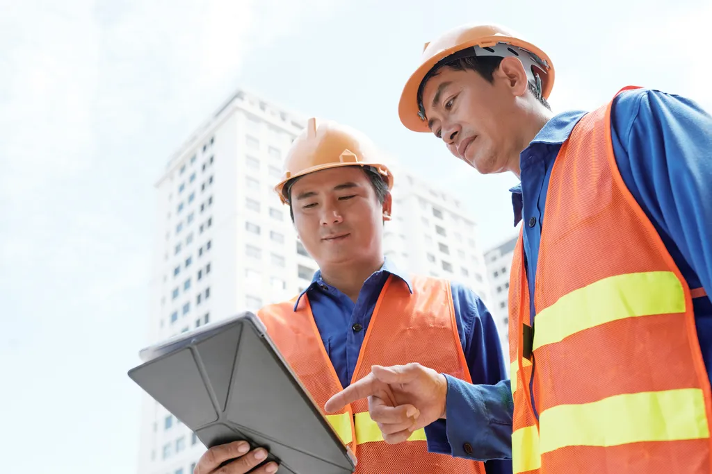 engineers-analyzing-data-digital-tablet